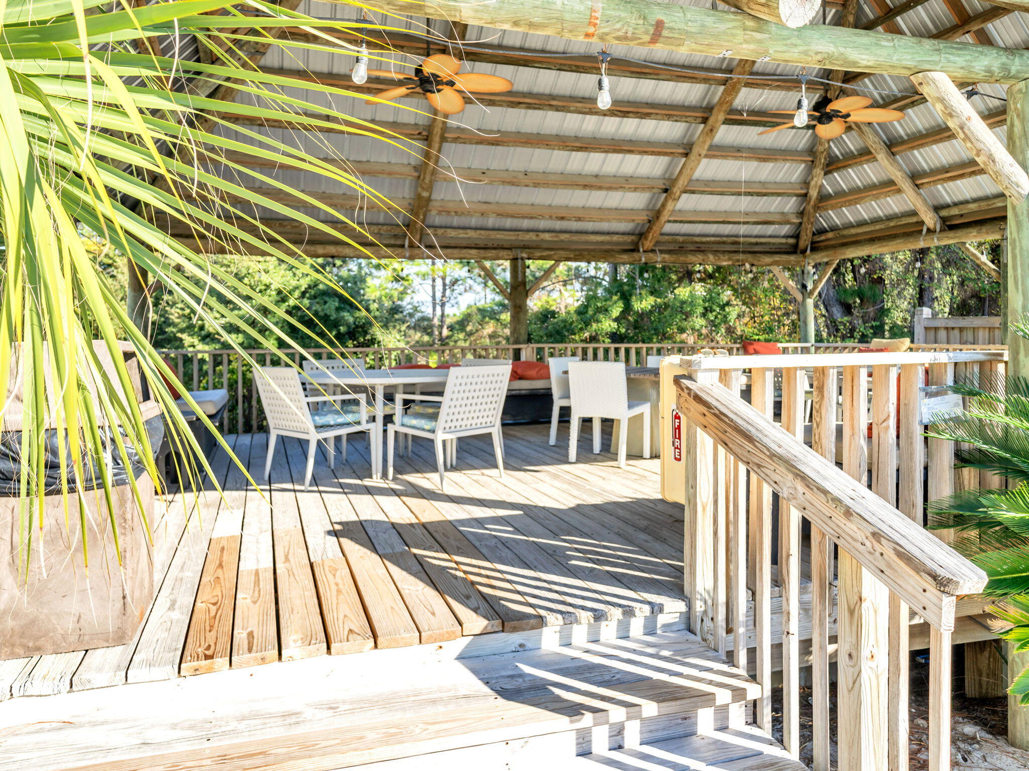 145 Beachfront Trail, Unit 307A Santa Rosa Beach, FL 32459 - Photo 40 of 60 a view of a patio with a table and chairs