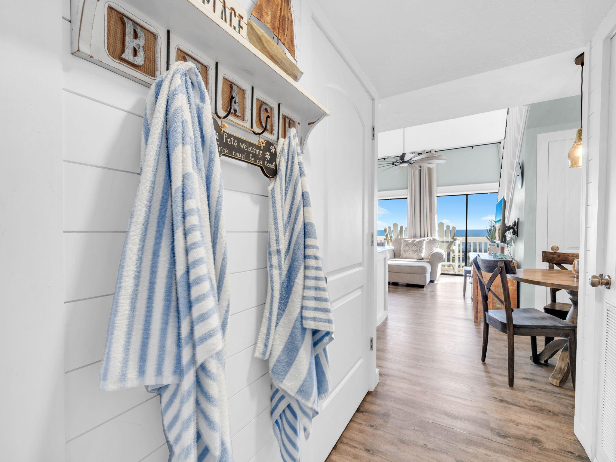 145 Beachfront Trail, Unit 307A Santa Rosa Beach, FL 32459 - Photo 9 of 60 a living room with furniture and a wooden floor