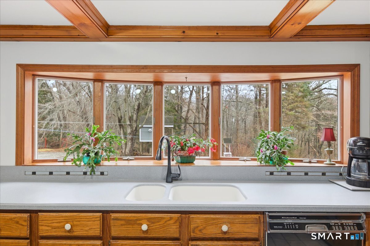 21 4 Mile River Road Old Lyme, CT 06371 - Photo 11 of 40 a view of counter top and porch with a potted plant