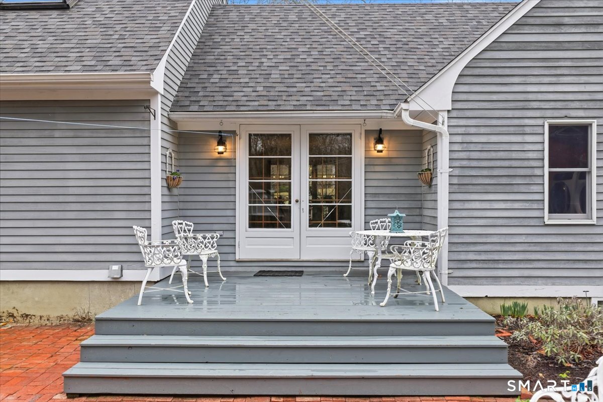 21 4 Mile River Road Old Lyme, CT 06371 - Photo 24 of 40 a view of house with outdoor seating space