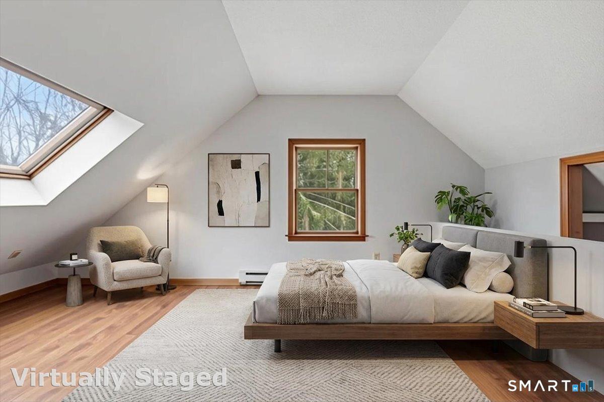 21 4 Mile River Road Old Lyme, CT 06371 - Photo 28 of 40 a bedroom with bed and window