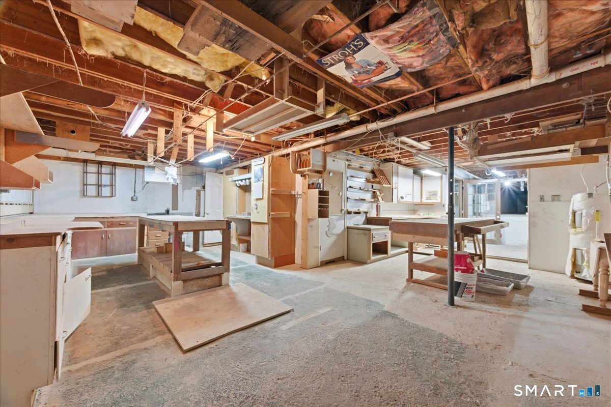 21 4 Mile River Road Old Lyme, CT 06371 - Photo 36 of 40 a view of a studio with wooden floor
