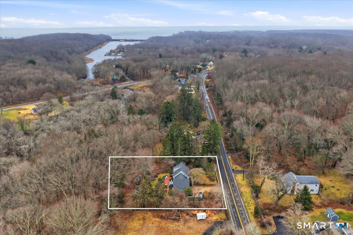 21 4 Mile River Road Old Lyme, CT 06371 - Photo 4 of 40 an aerial view of house with yard