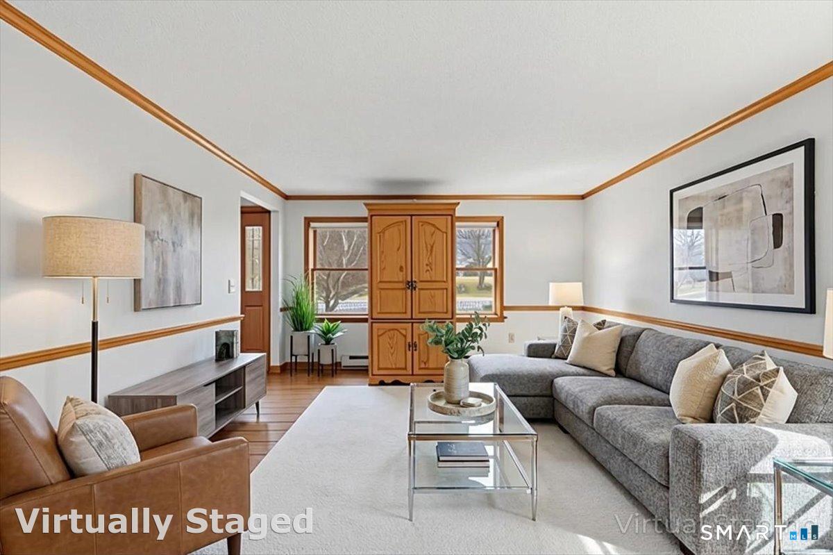 21 4 Mile River Road Old Lyme, CT 06371 - Photo 8 of 40 a living room with furniture and a large window