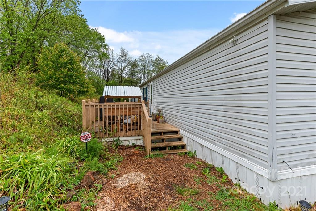 3 Buckner Road Leicester, NC 28748 - Photo 2 of 28 a view of a house with a yard