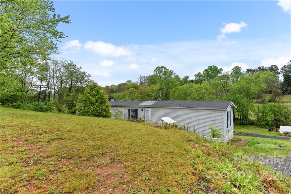 3 Buckner Road Leicester, NC 28748 - Photo 3 of 28 a view of a house with a yard