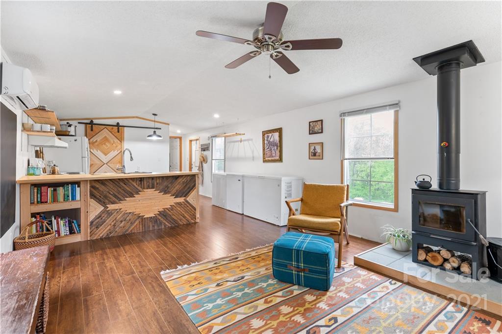3 Buckner Road Leicester, NC 28748 - Photo 5 of 28 a living room with furniture and a fireplace