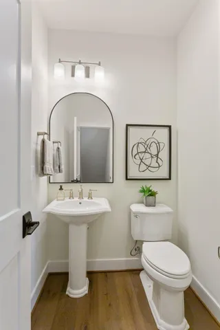 a building outdoor space with patio furniture and potted plants