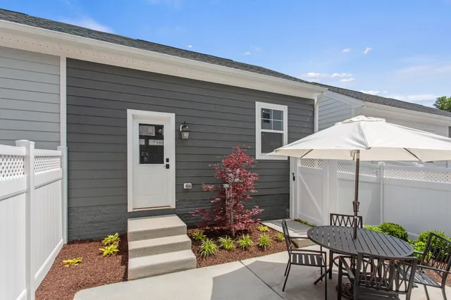 a view of a back yard of the house