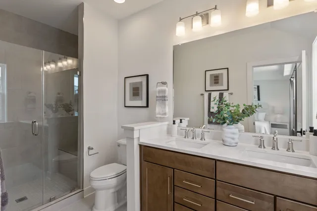 a bedroom with furniture and a book shelf
