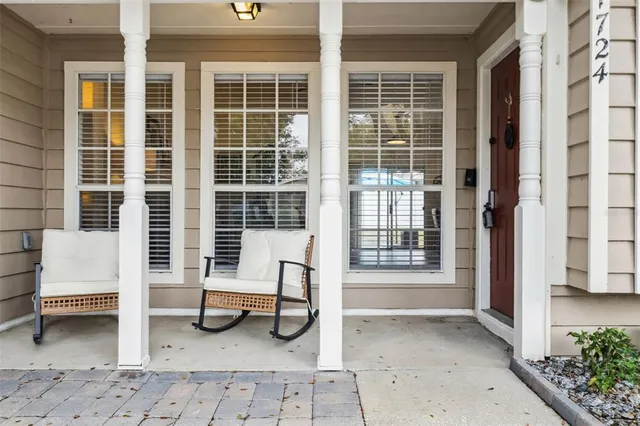 a view of a porch with a bench