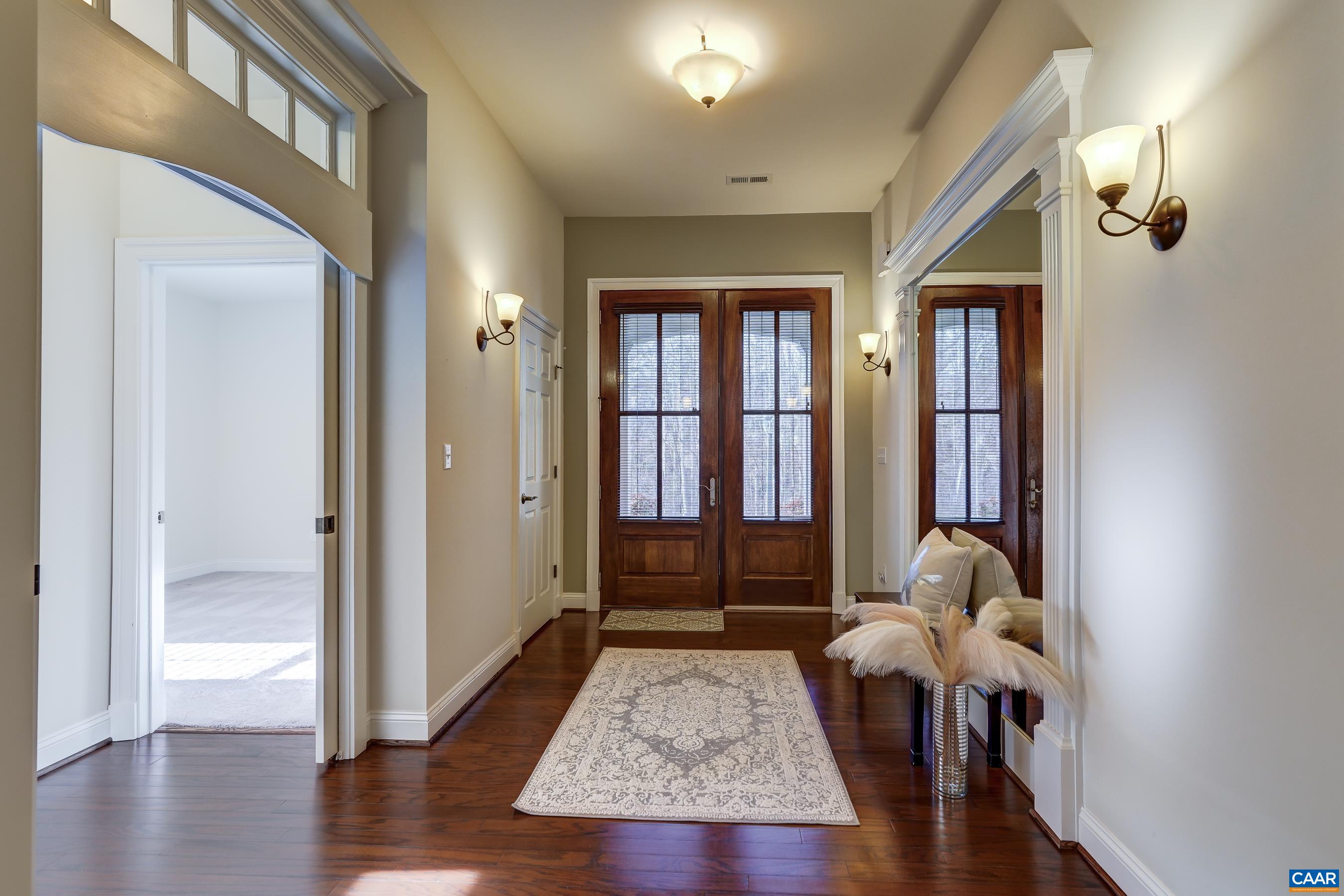4634 Mechums River Road Charlottesville, VA 22901 - Photo 5 of 59 Transom windows, and high-end trim detailing throughout the home.