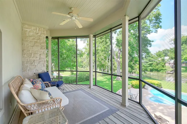 a spacious bathroom with a double vanity sink and a mirror