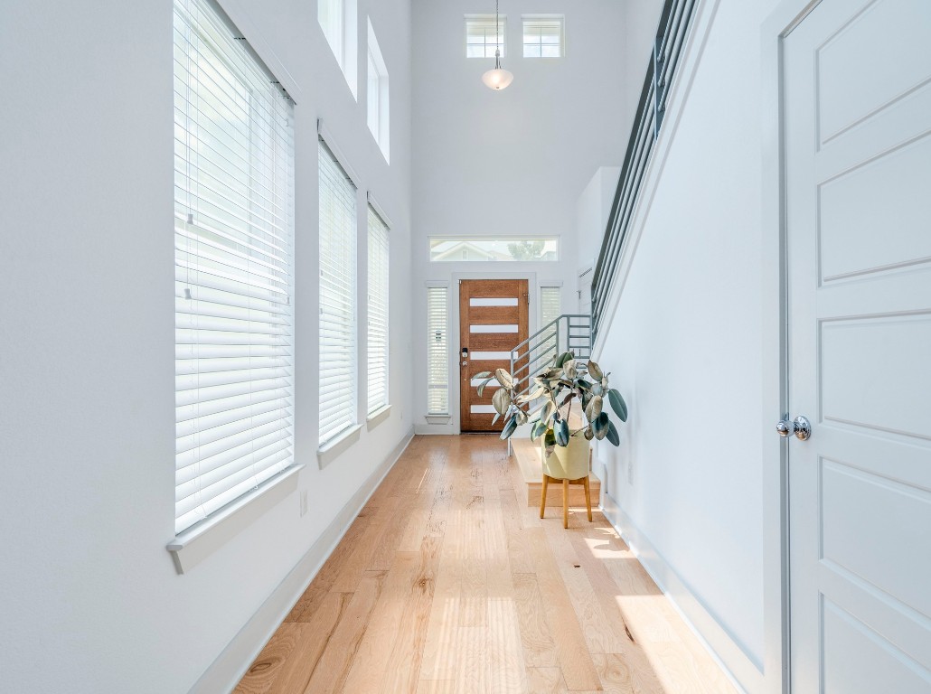 2309 Hermia Street Austin, TX 78741 - Photo 1 of 30 a view of entryway and hall with wooden floor
