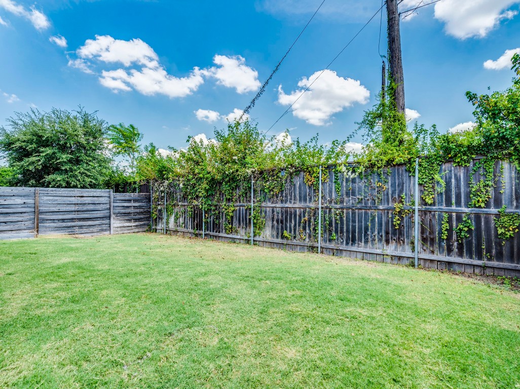 2309 Hermia Street Austin, TX 78741 - Photo 27 of 30 a view of a house with a backyard