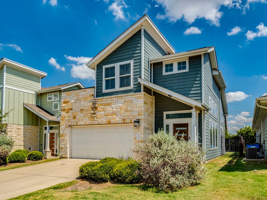 2309 Hermia Street Austin, TX 78741 - Photo 5 of 30 a front view of a house with garden