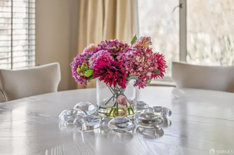 a vase of flowers sitting on a table