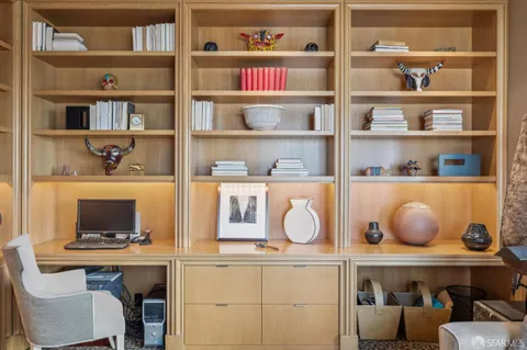 a bathroom with a granite countertop sink mirror toilet and bathtub