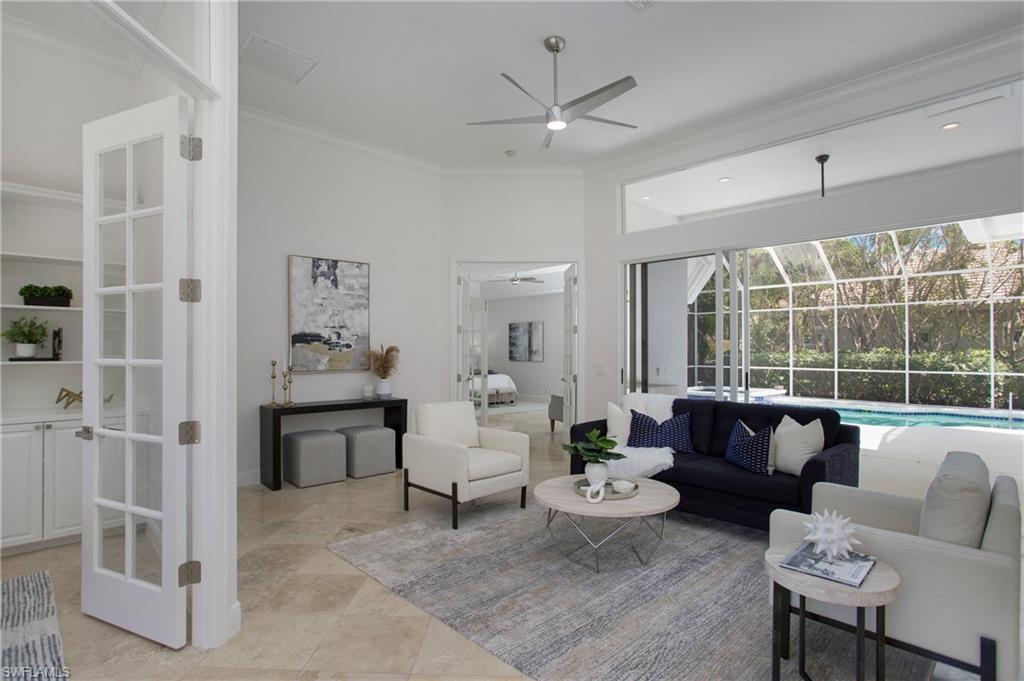 1984 Mission Drive Naples, FL 34109 - Photo 3 of 50 a living room with furniture and a large window