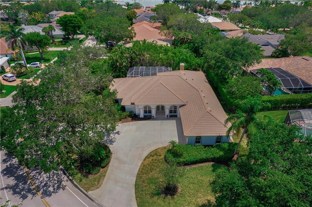 1984 Mission Drive Naples, FL 34109 - Photo 42 of 50 an aerial view of a house with yard and street view
