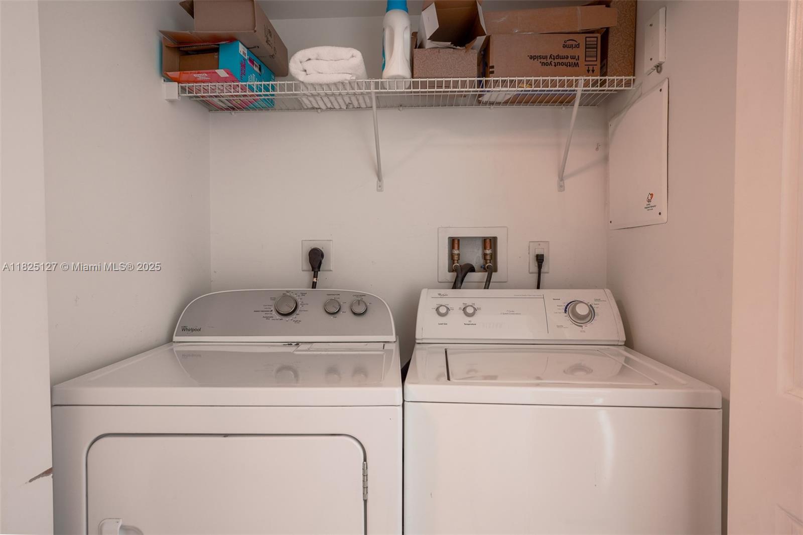 1250 South Miami Avenue, Unit 3003 Miami, FL 33130 - Photo 13 of 31 a utility room with dryer and washer