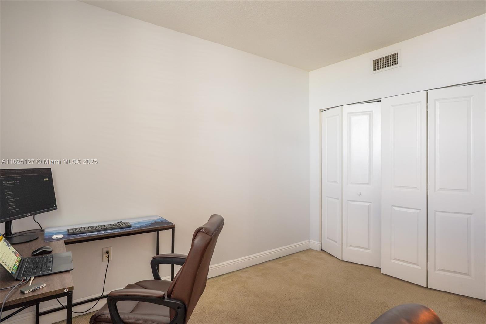 1250 South Miami Avenue, Unit 3003 Miami, FL 33130 - Photo 22 of 31 a view of a workspace with furniture