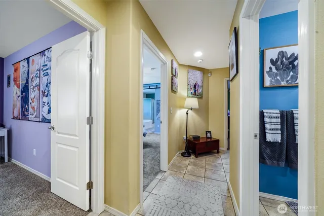 a bathroom with a mirror and a shower