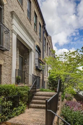 a sign that is on a brick building