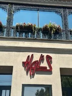 a view of a yard with cars