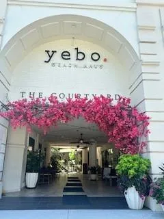 a view of a building with sitting area