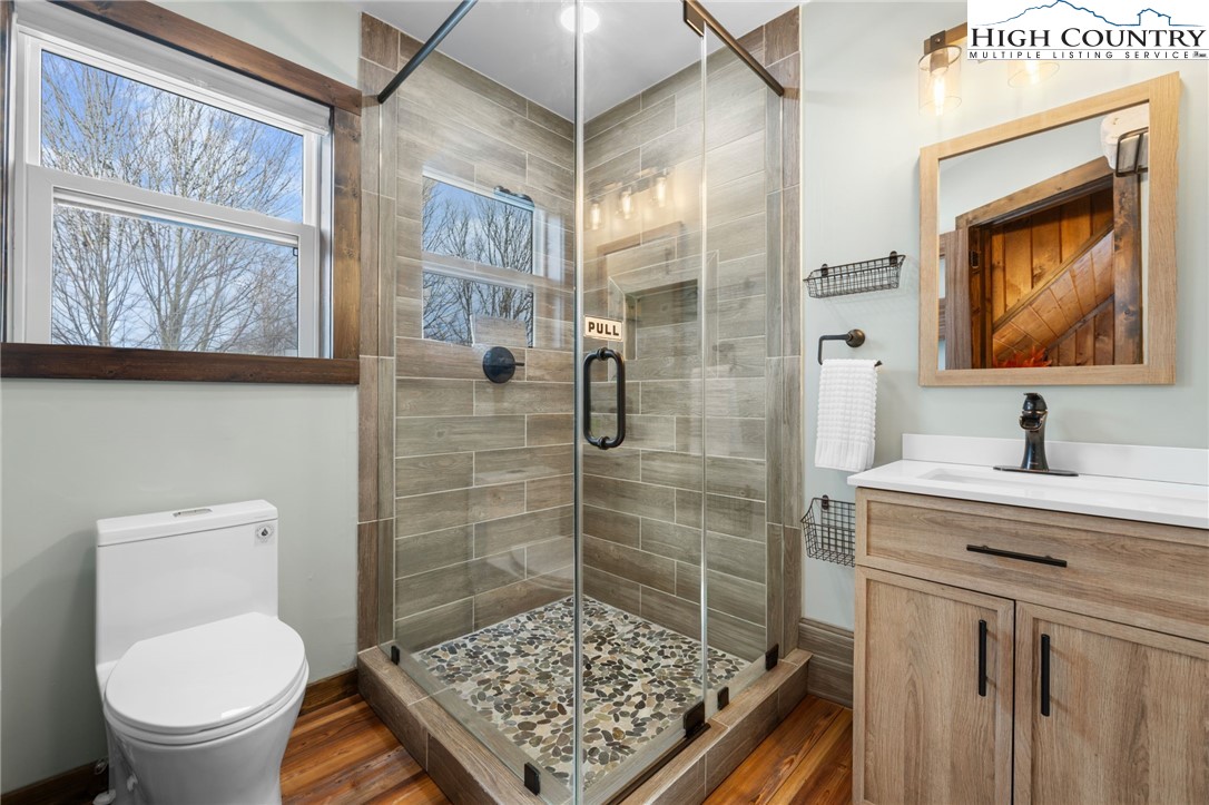123 St Andrews Road Beech Mountain, NC 28604 - Photo 43 of 47 a bathroom with a sink toilet and shower