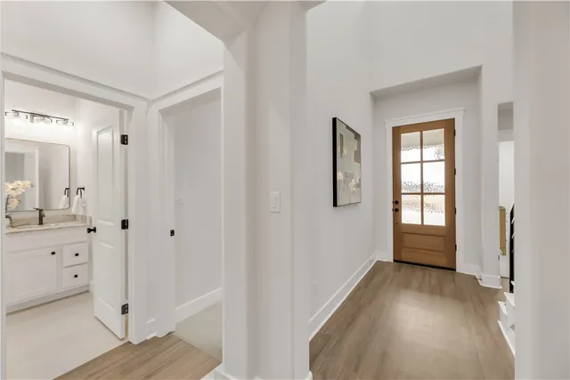 a living room with furniture a window and a table