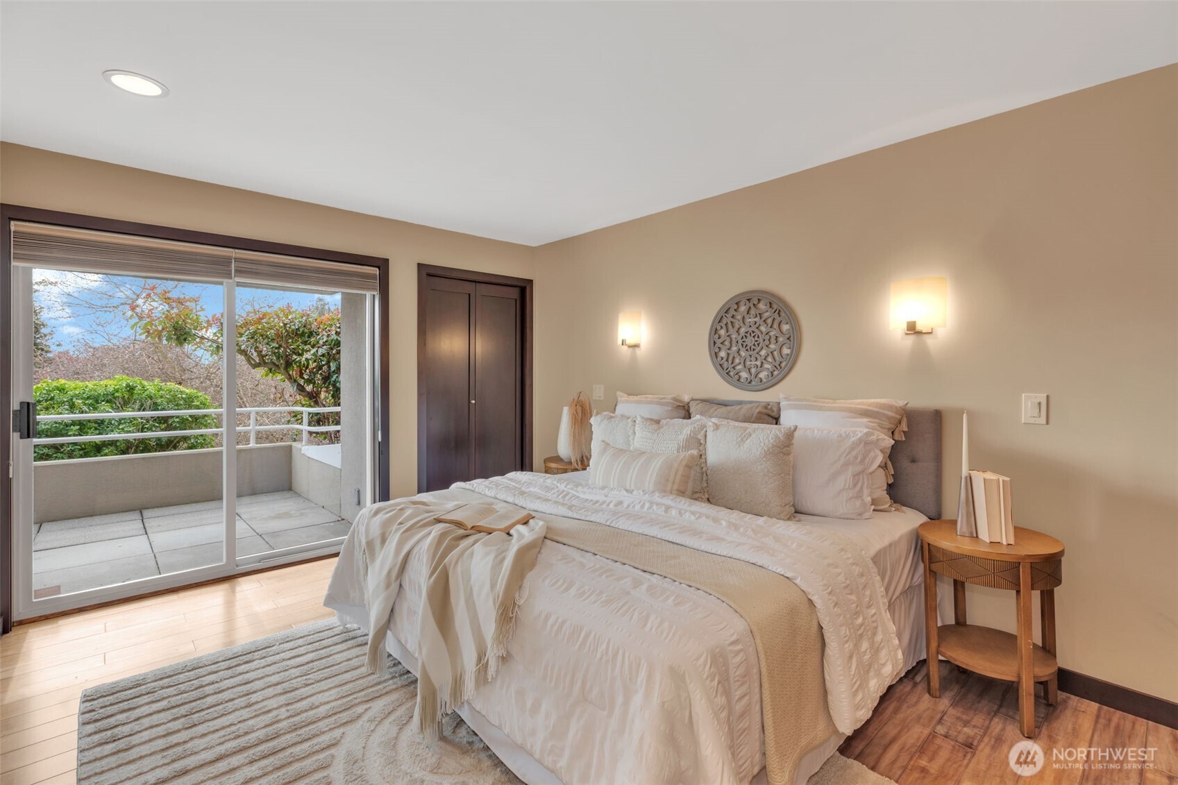 1231 5th Avenue North, Unit 101 Seattle, WA 98109 - Photo 11 of 31 a bed room with a bed and a large window