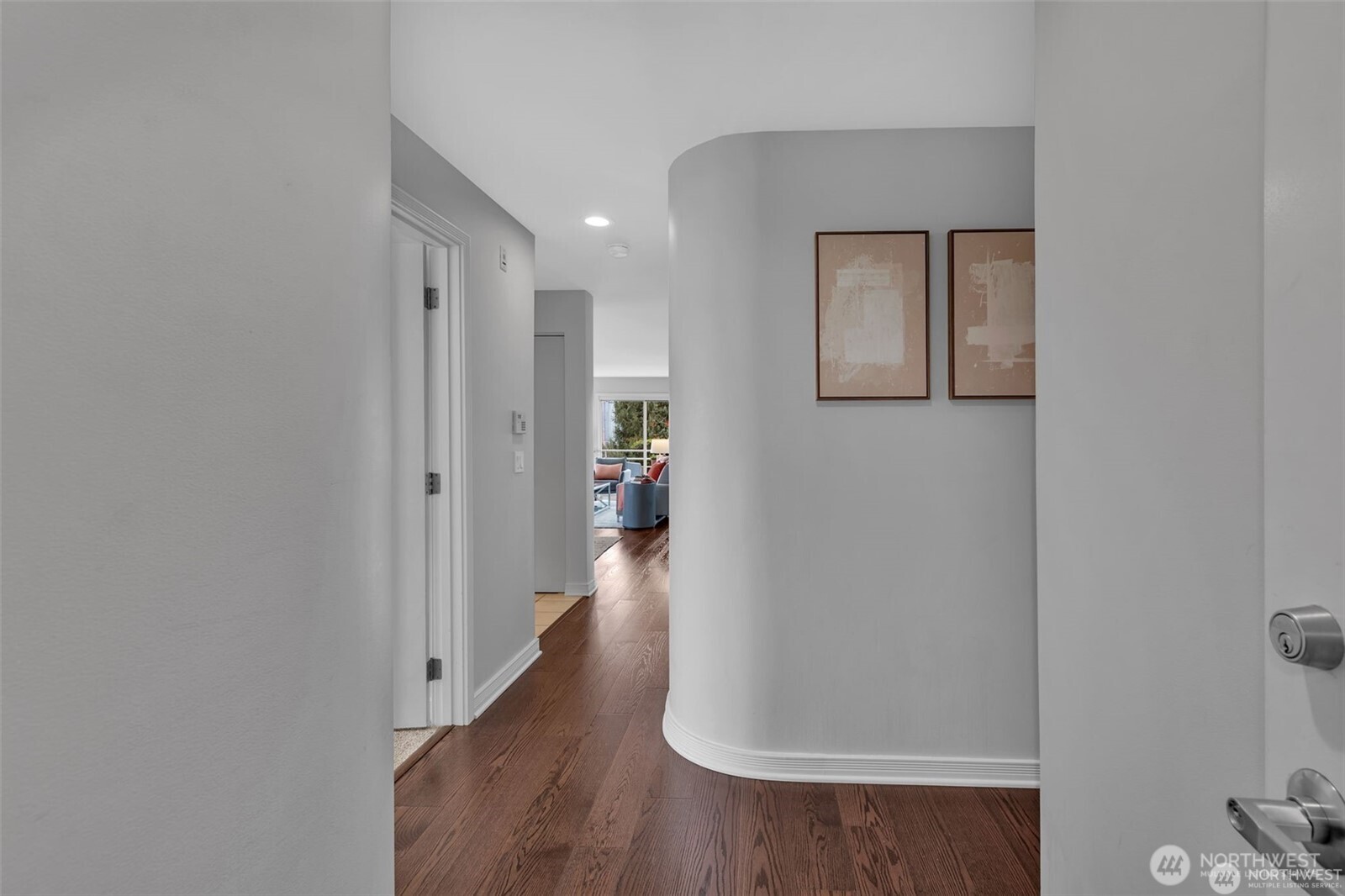 1231 5th Avenue North, Unit 101 Seattle, WA 98109 - Photo 21 of 31 a view of a hallway with wooden floor