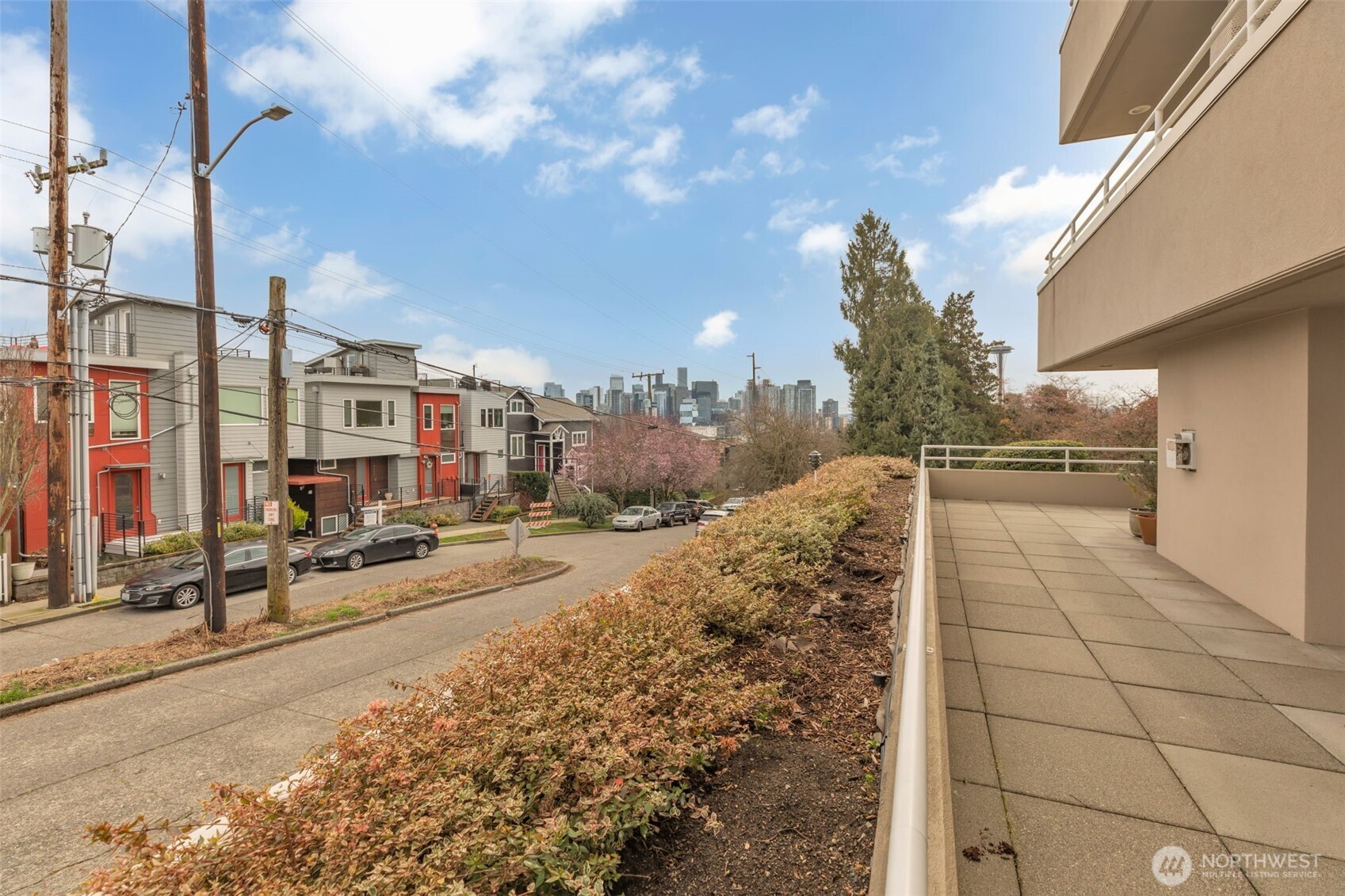 1231 5th Avenue North, Unit 101 Seattle, WA 98109 - Photo 29 of 31 a view of a pathway with a building in the background