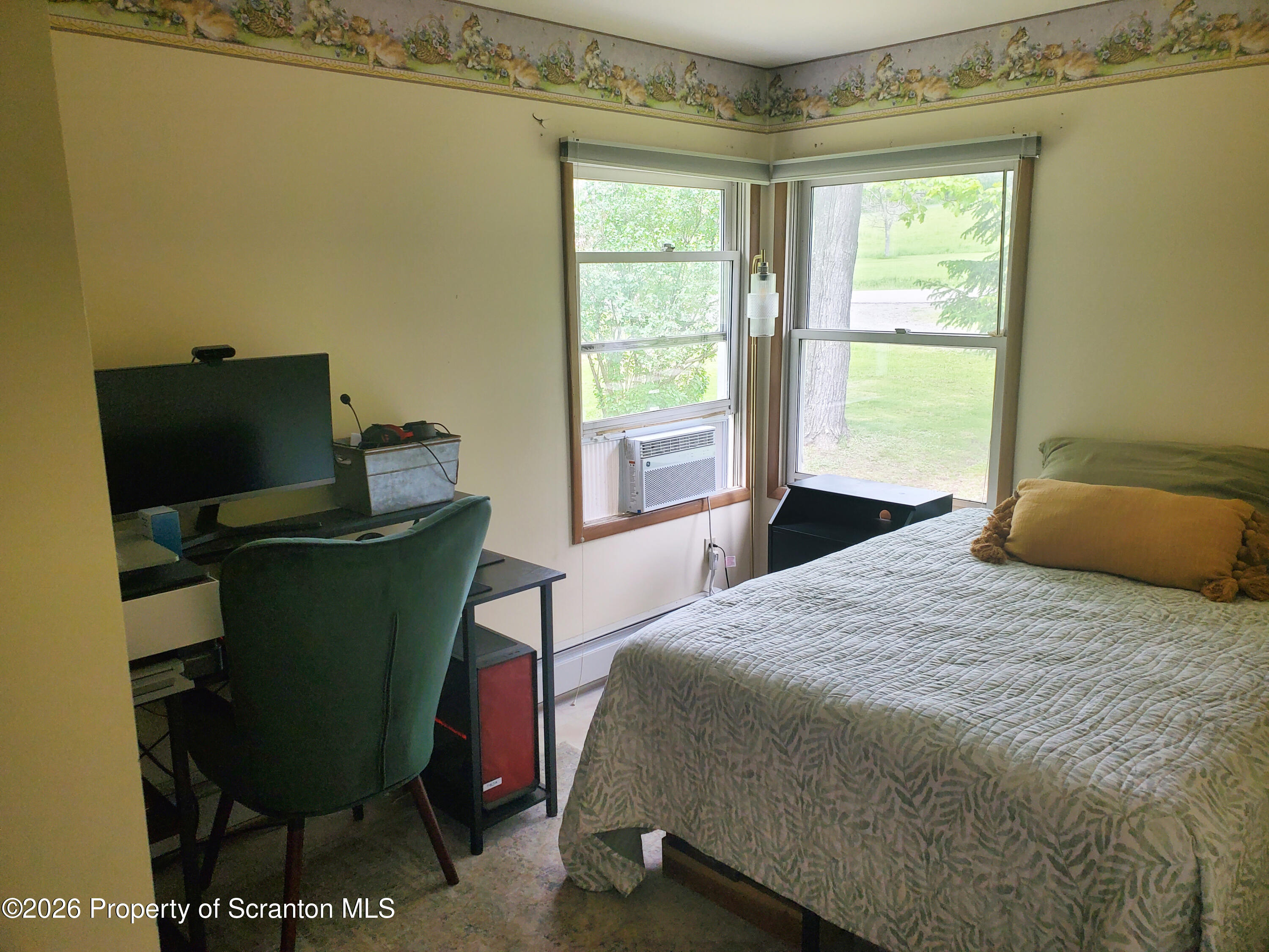 220 Brinkman Road Brackney, PA 18812 - Photo 16 of 32 a bedroom with a bed and a window