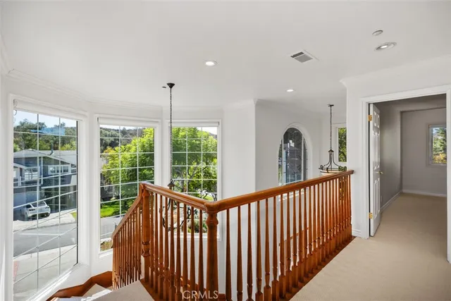 a view of a room with balcony and furniture