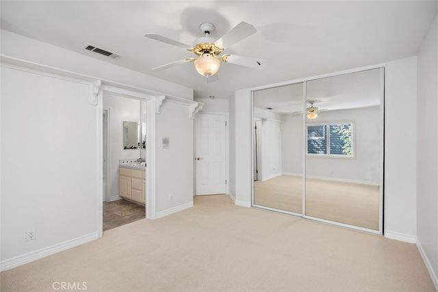 a bed room with a bed and a fireplace