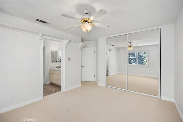 a bed room with a bed and a fireplace