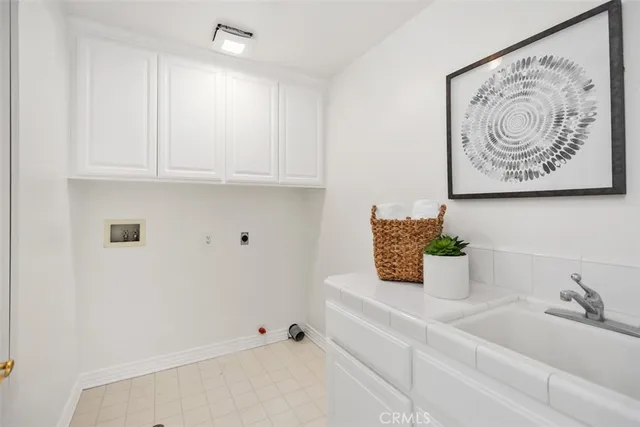 a spacious bedroom with a bed and a fireplace