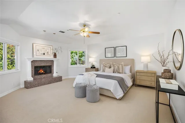 a bathroom with a sink a large mirror and a shower