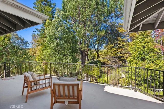 a view of a street with a building in the background