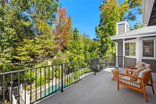 a view of a street with a building in the background
