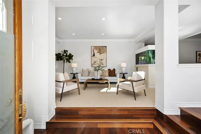 a living room with furniture and a rug