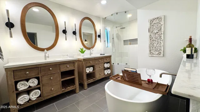 a bathroom with a double vanity sink and a mirror