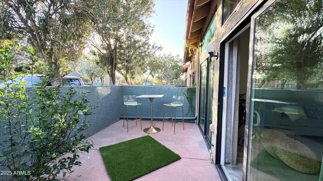 a view of a back yard from a balcony