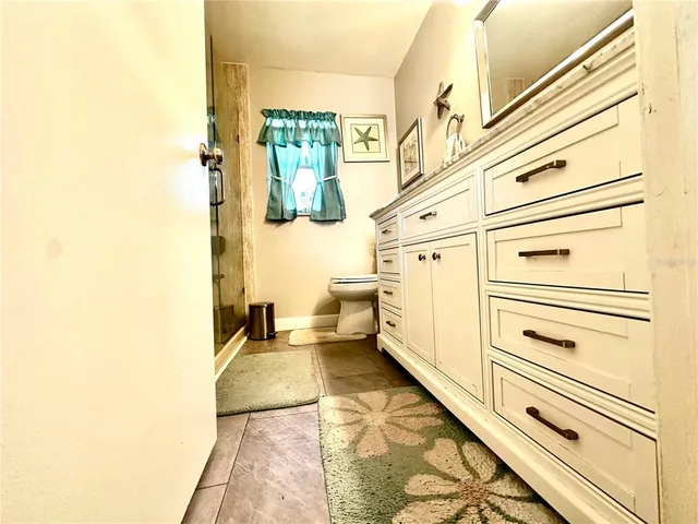 a view of front door and bedroom