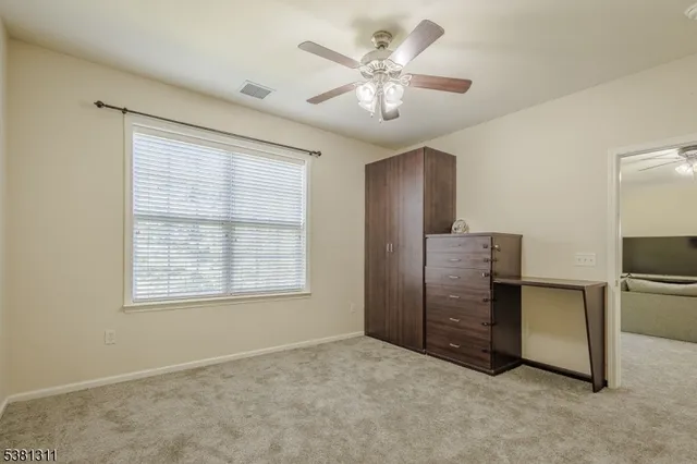 a view of an empty room with a stove
