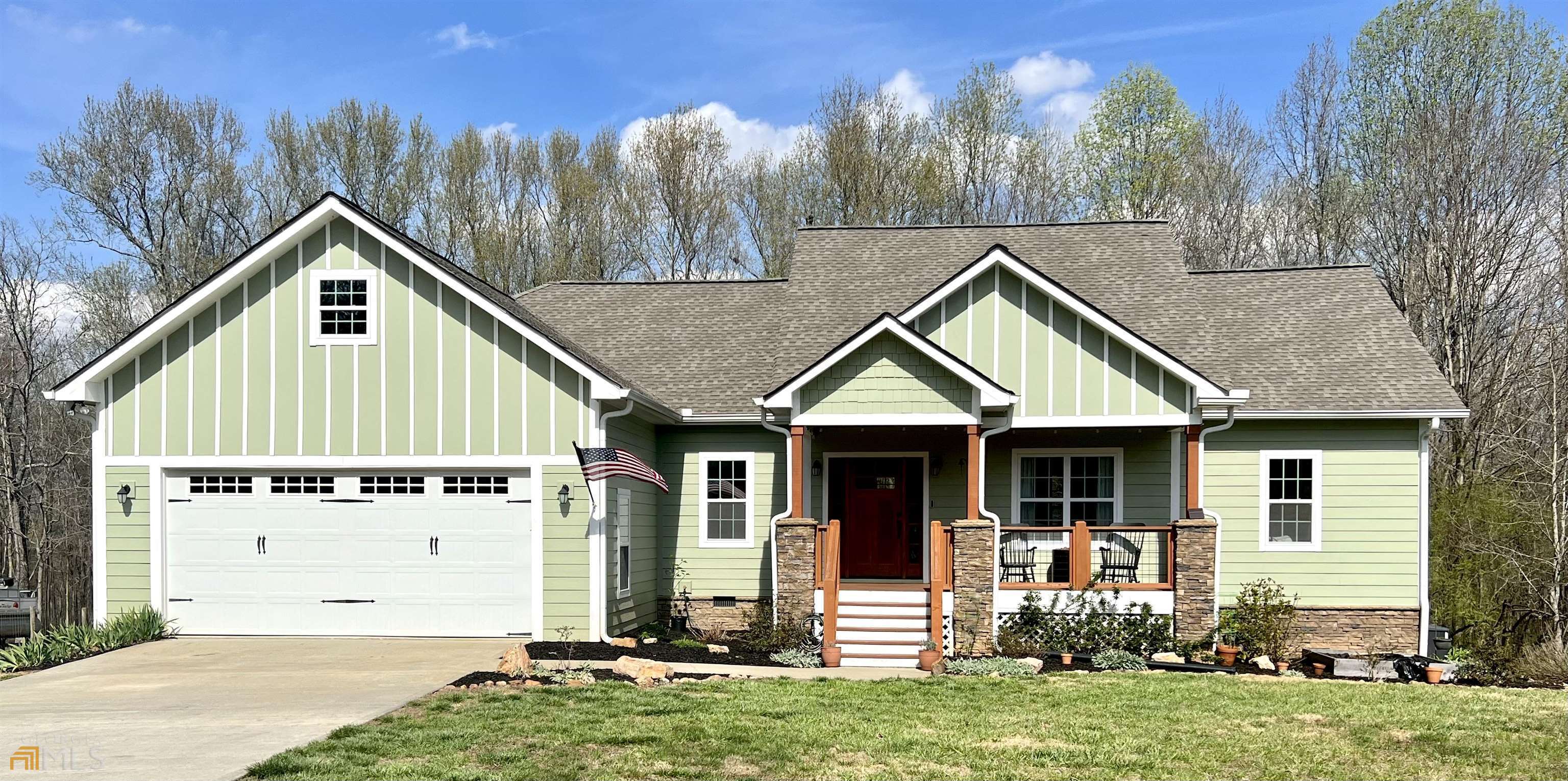 2188 Westmoreland Road Cleveland, GA 30528 - Photo 1 of 1 a front view of a house with garden