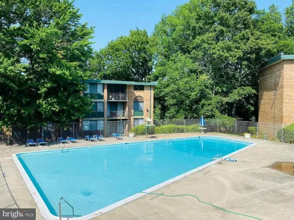 a view of a house with swimming pool